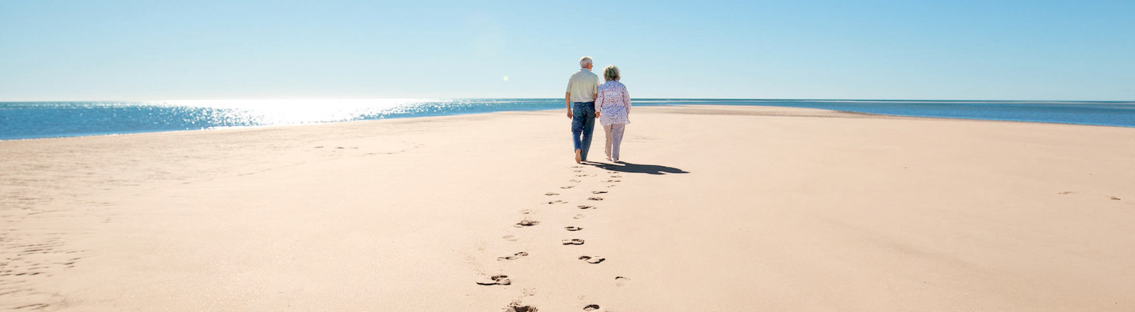 Couple Walking on Beach Whitsundays Romantic holiday